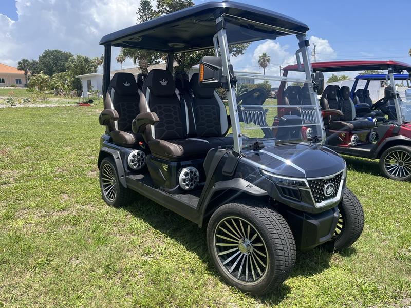 Front view of 2025 Evolution D-Max GT4 Black golf cart available in Pennsylvania with nationwide delivery and export options