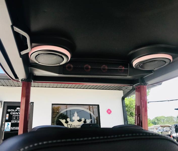 Rear cargo and utility section of 2025 Evolution D-Max GT4 Red electric golf cart available in New York with export and nationwide delivery