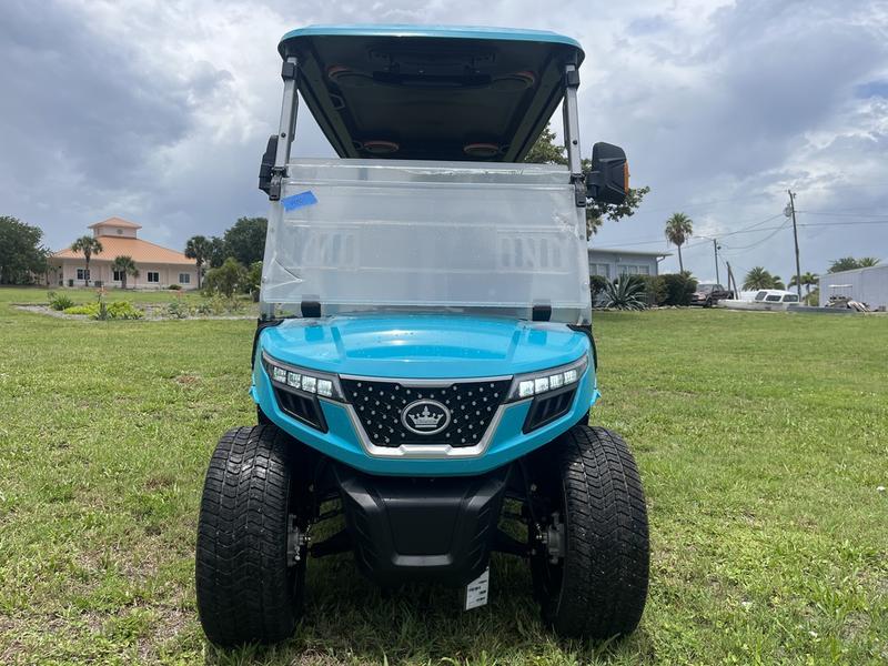 Side profile of 2025 Evolution D-Max GT4 Sky Blue four-passenger electric golf cart, nationwide delivery and export available