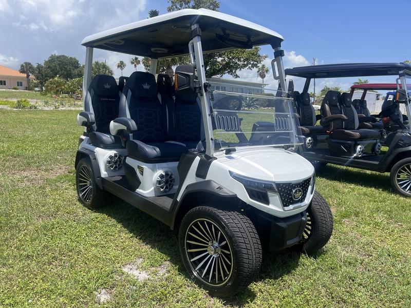 Front view of 2025 Evolution D-Max GT4 White golf cart available in Alabama with nationwide delivery and export options
