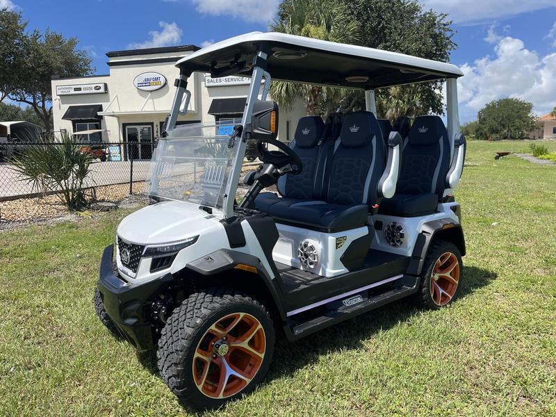 Side profile of 2025 Evolution D-Max XT4 electric golf cart in North Carolina with export and delivery availability