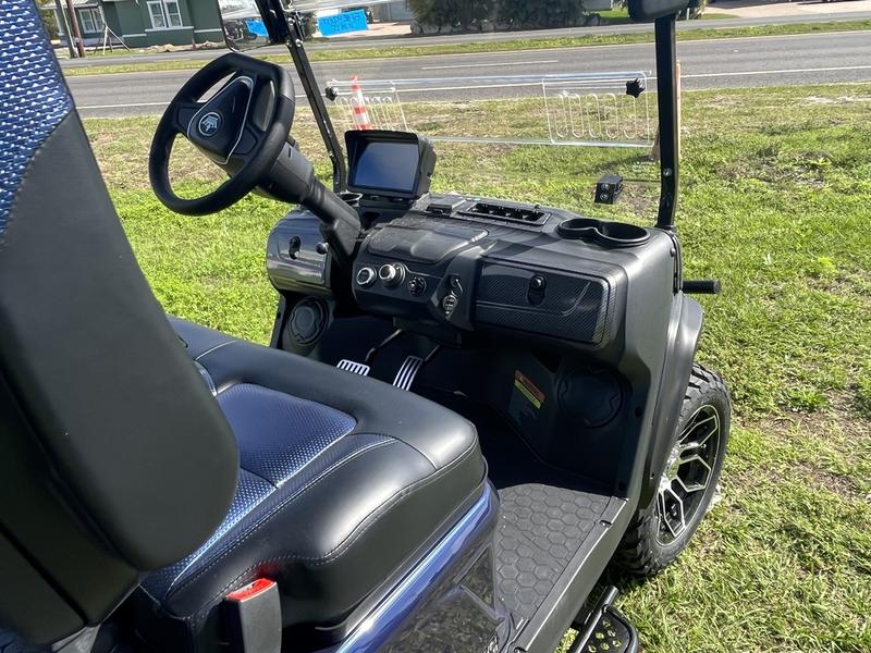 Dashboard interior of 2025 Evolution D5-Maverick 4 blue electric golf cart