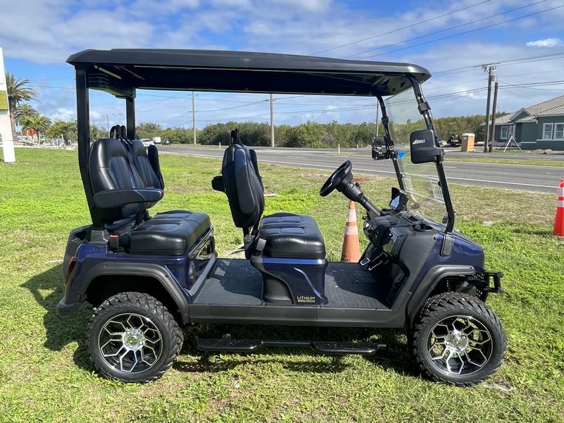 Side profile of 2025 Evolution D5-Maverick 4 blue four-seater golf cart