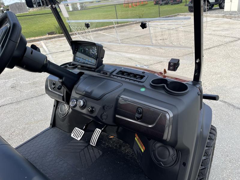 Dashboard interior of 2025 Evolution D5-Maverick 4 red electric golf cart