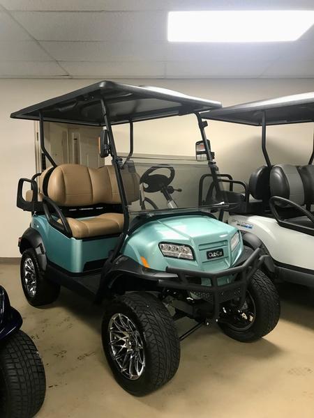 Side view of 2025 Club Car Onward Lifted 4 Passenger HP Lithium golf cart in Atlanta Georgia