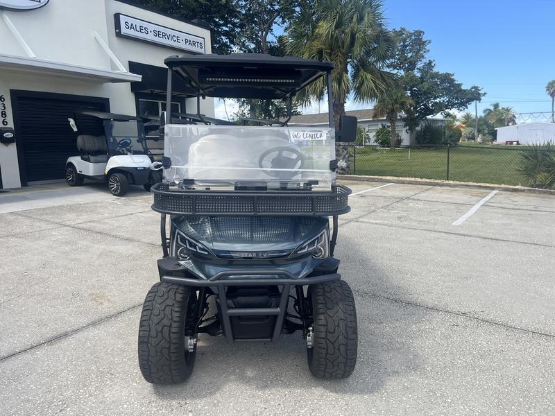 Front view of 2026 Star EV J-Model 4+2 Lifted at Grey Oaks Country Club in Naples, Florida.