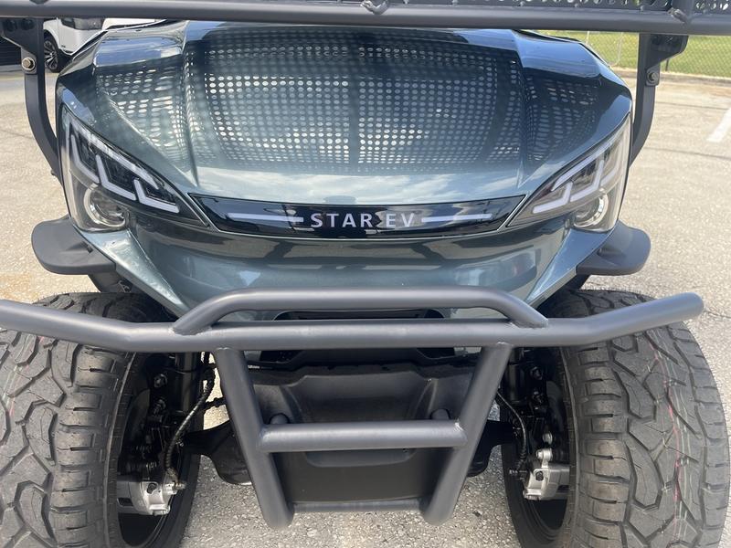 Rear view of 2026 Star EV J-Model 4+2 Lifted at Grey Oaks in Naples.