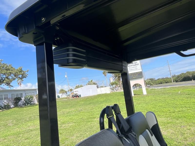 Street-legal 2025 Evolution D5-Maverick 4 blue golf cart on road